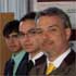 ofesor Juan Manuel Uribe junto a la Profesora Loreto Cánaves S.visitando la feria